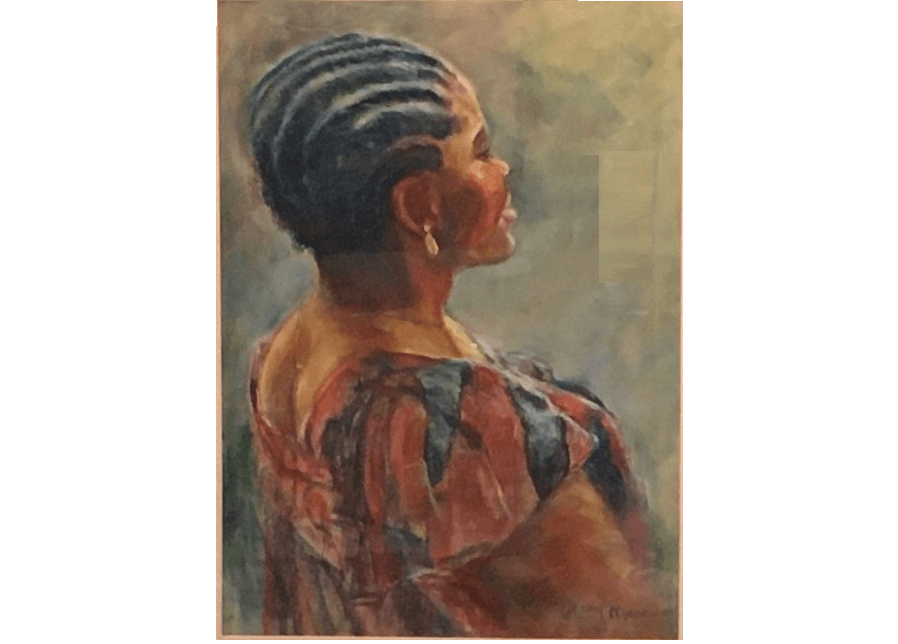 portrait of dark skinned woman with braided hair and brightly colored dress