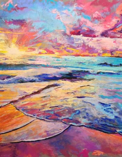 very colorful beach scene at sunset. Imagine hues of turquoise, pink, orange, purple in the sky and the waves washing up on shore.