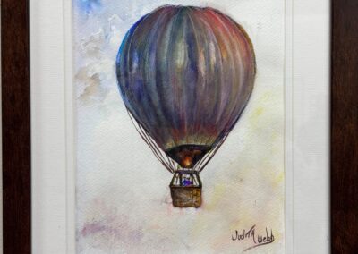 painting of a shiny hot air balloon above the clouds