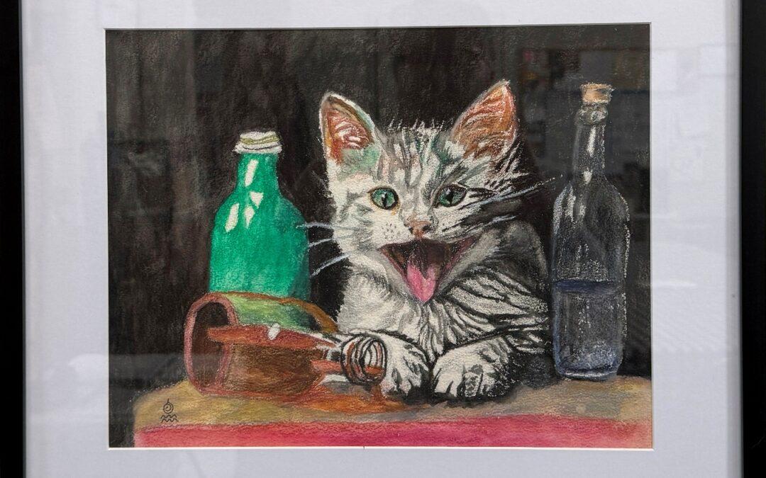 painting of a mischievous kitten in between 2 standing bottles and one bottle tipped over by the kittens paws. It's tongue is lolling as if it has been licking the spilled liquid