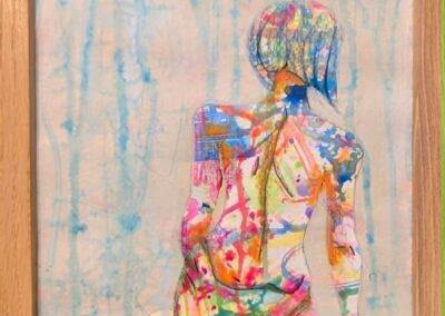 painting of a woman sitting comfortably. Her back is to the viewer and her skin is a palette of many colors